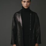 Veste en 100% cuir d'agneau, élégante et résistante, pour un look raffiné.