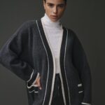 Cardigan gris pour femme, en mélange 50% cachemire et 50% laine, doux et élégant.