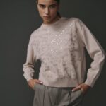 Pull écru en 100% laine, confortable et élégant pour femme.