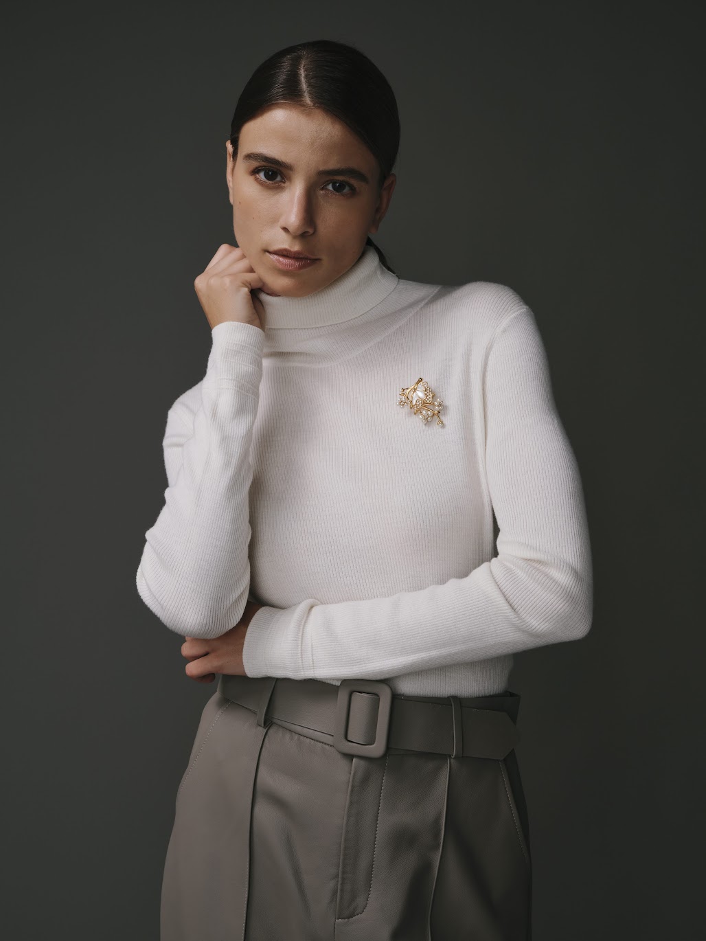 Col roulé en 100% laine écru pour femme, élégant et chaleureux.