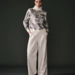 Pantalon écru pour femme en 100% cuir d'agneau, coupe élégante et finition haut de gamme