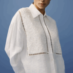 Chemise femme blanche en lin naturel, fluide et élégante.