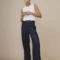 Top femme écru en laine, doux et confortable.