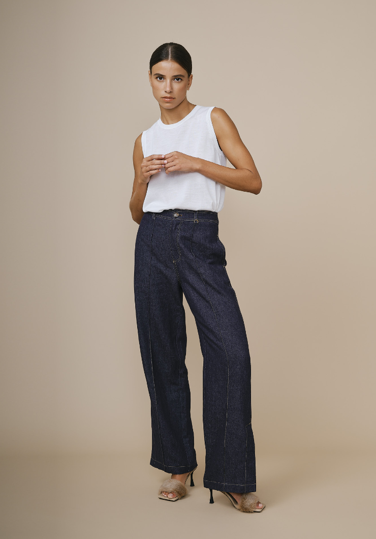 Top femme écru en laine, doux et confortable.